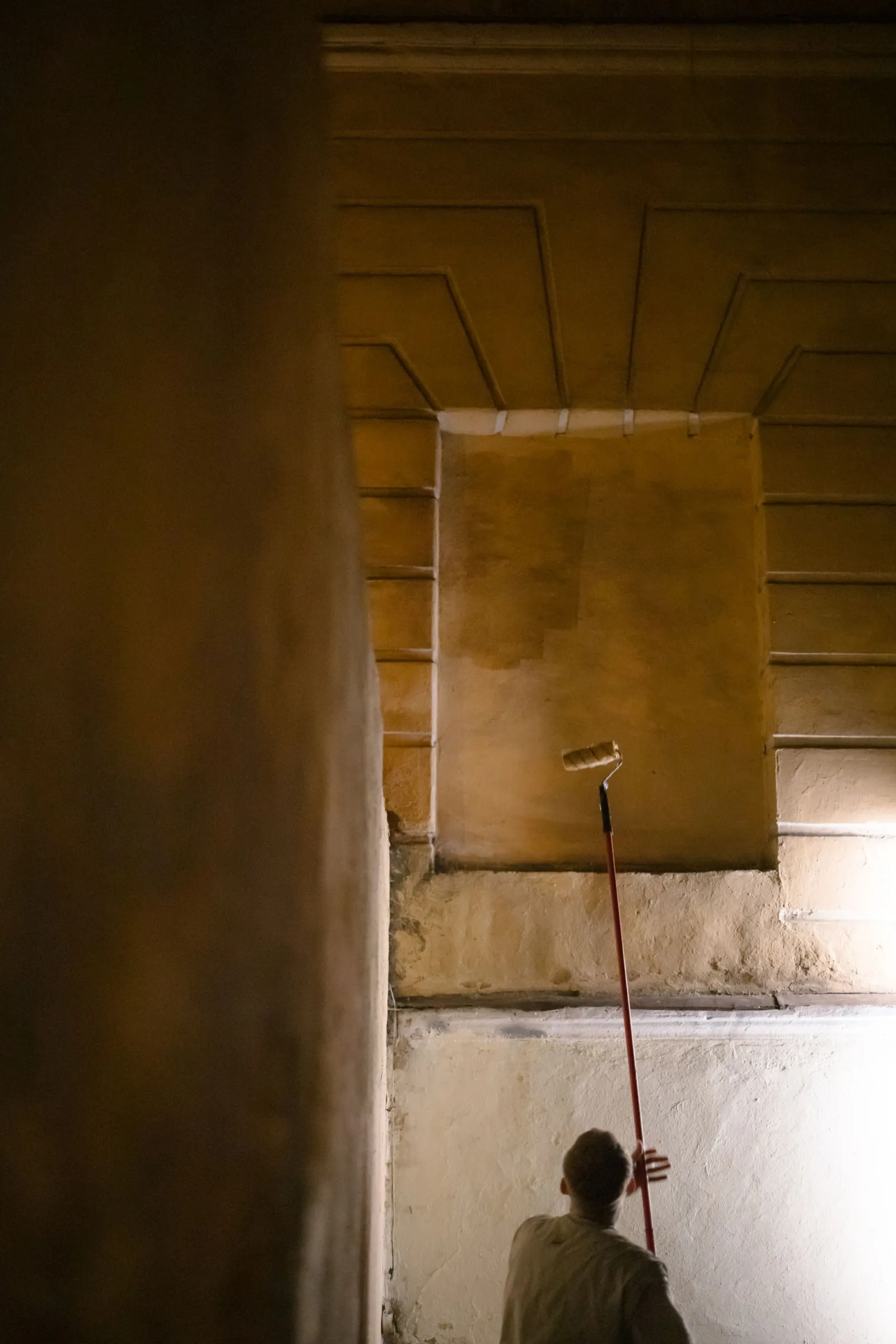 Interior room with walls being prepared for painting