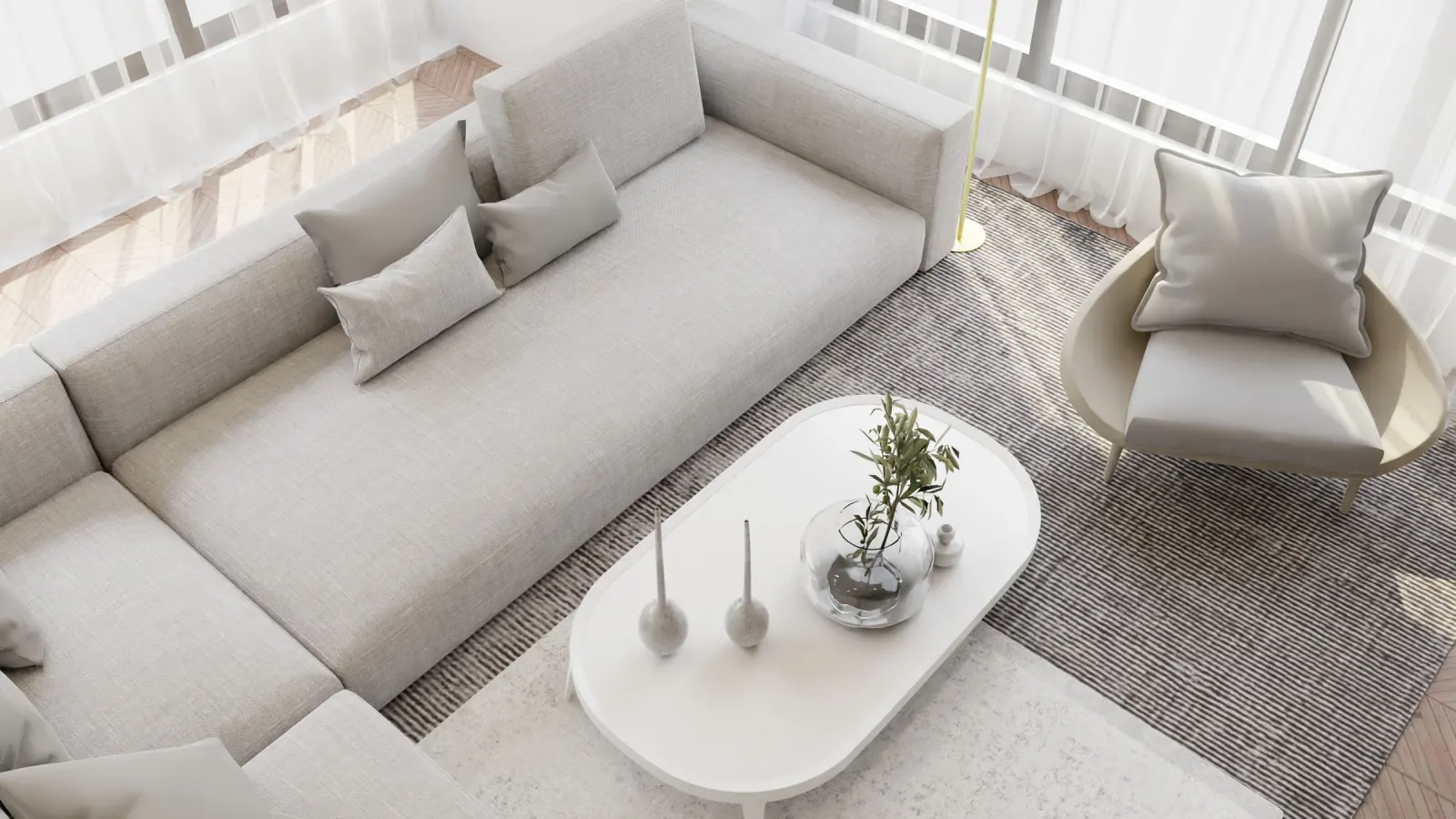 Finished living room with a pale sofa and clean painted walls